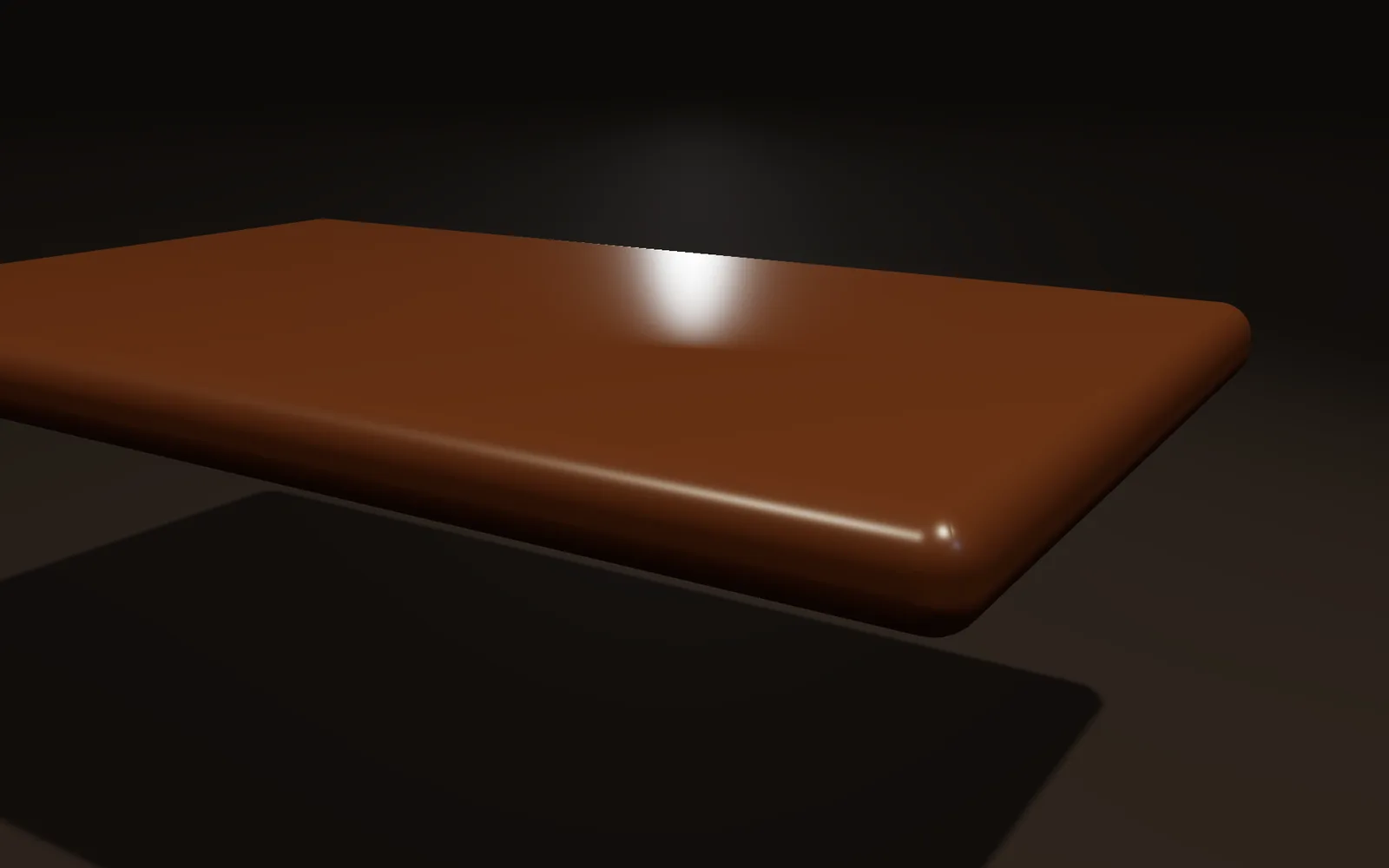 a walnut table top with a rounded edge shaped from a drawn profile