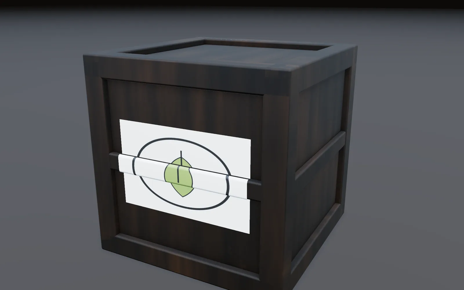 a leaf logo stuck on the front of a wooden crate as a decal