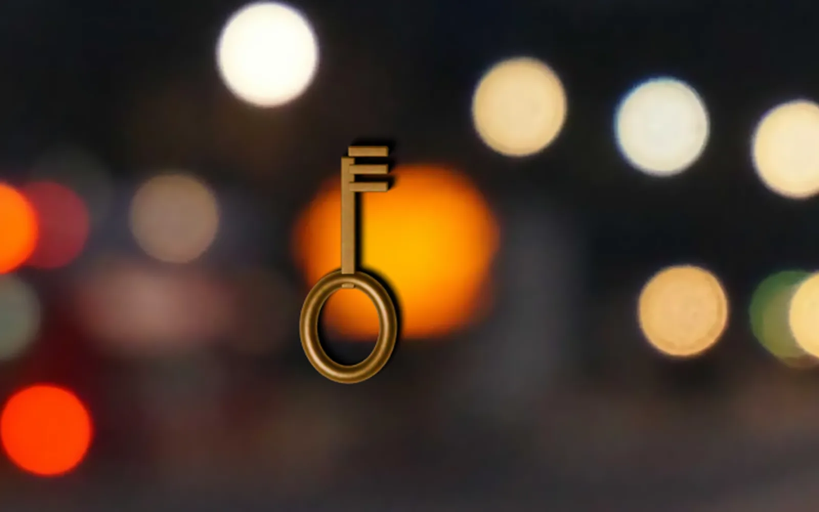 a brass key placed into the denoised night street, carrying the photo's grain