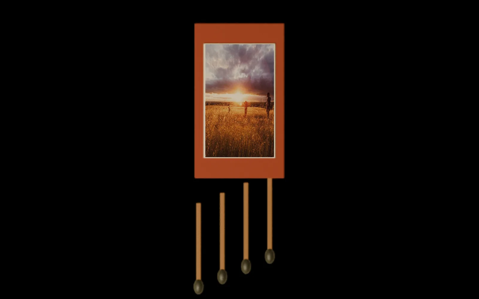 a photo print pinned to the face of a matchbox, the box's shading showing through