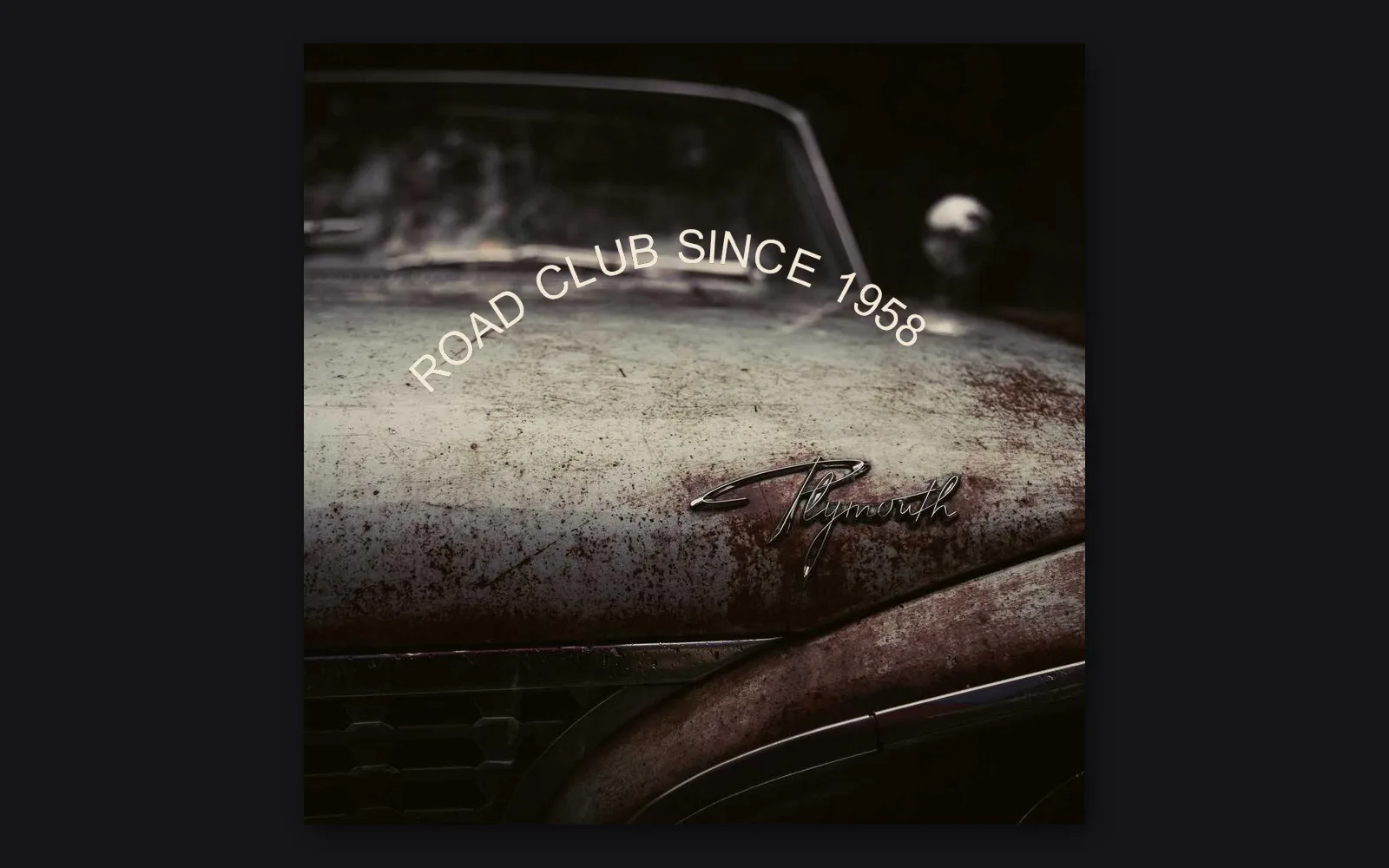 ROAD CLUB SINCE 1958 set on a curve over an old car