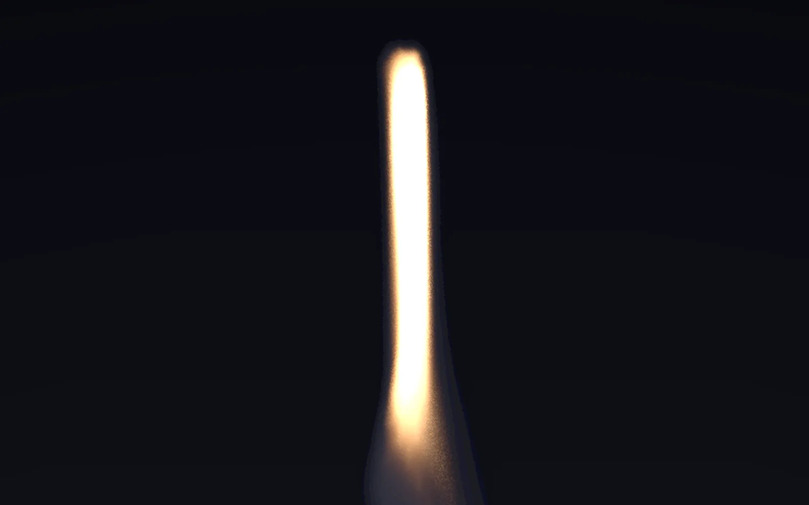 a white-hot column of flame pouring down from the nozzle