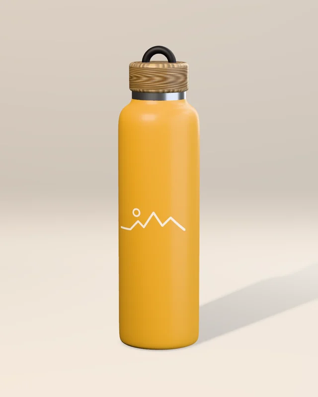 The bottle in mustard yellow on a warm studio backdrop, lit from the left with a soft shadow to the right