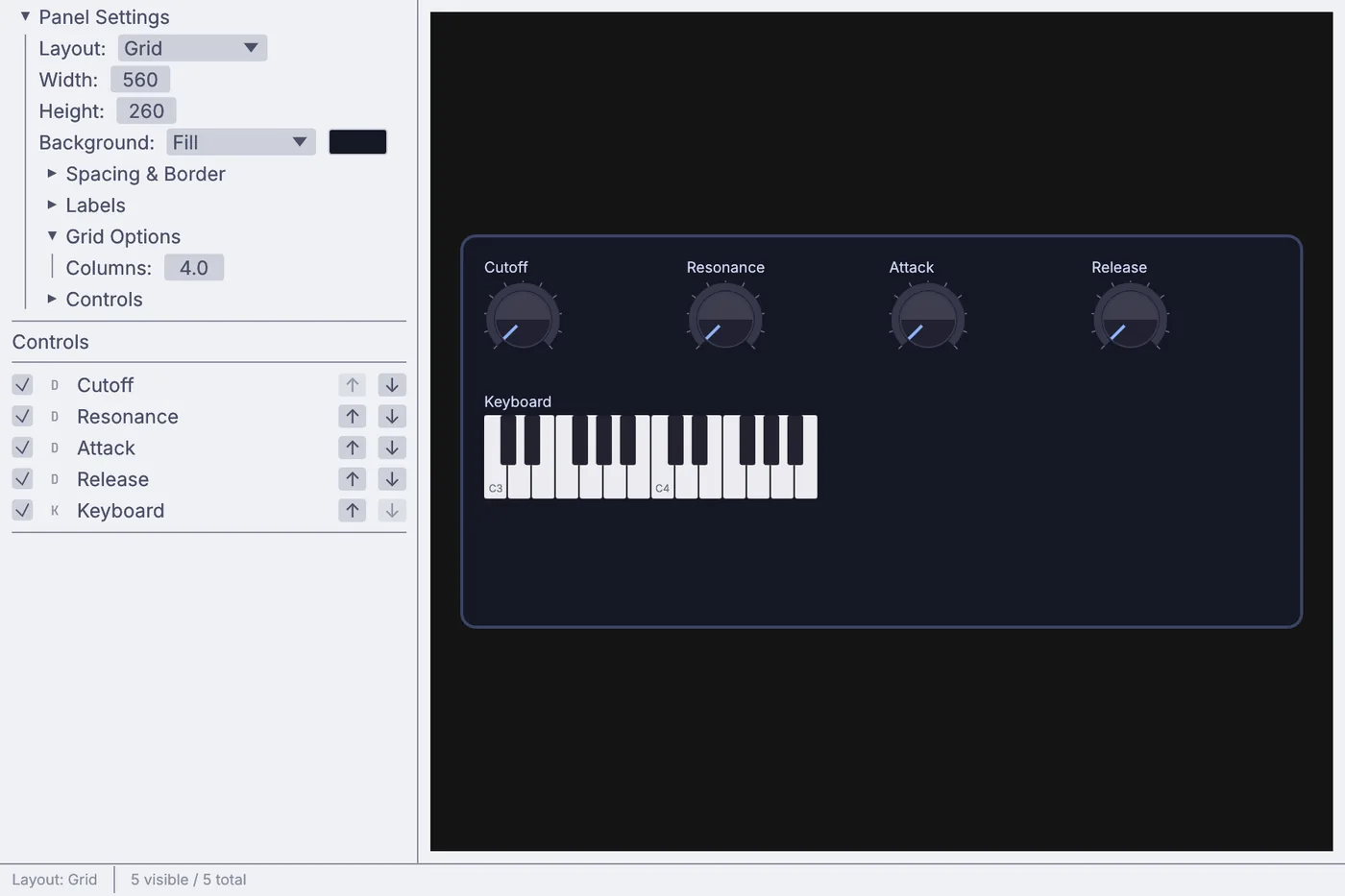 The Panel Editor: the controls list on the left and the panel laid out on a grid.